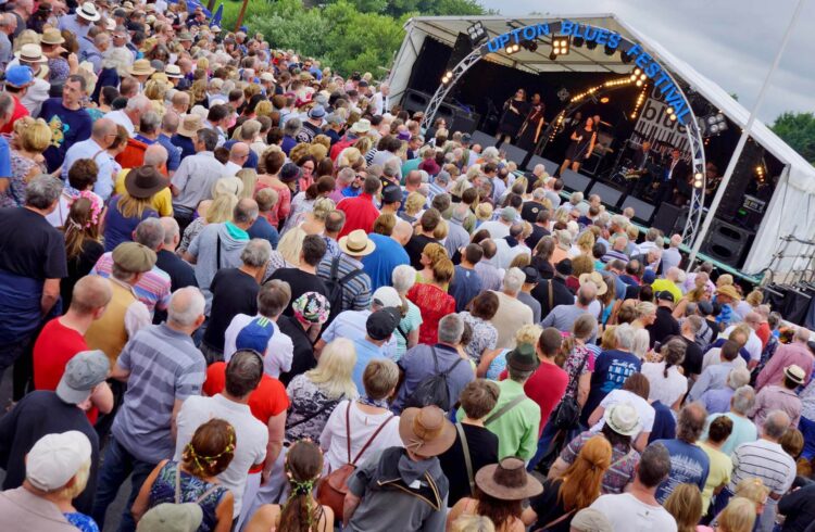 Daytime crowd on the Riverside by Oliver Carpenter