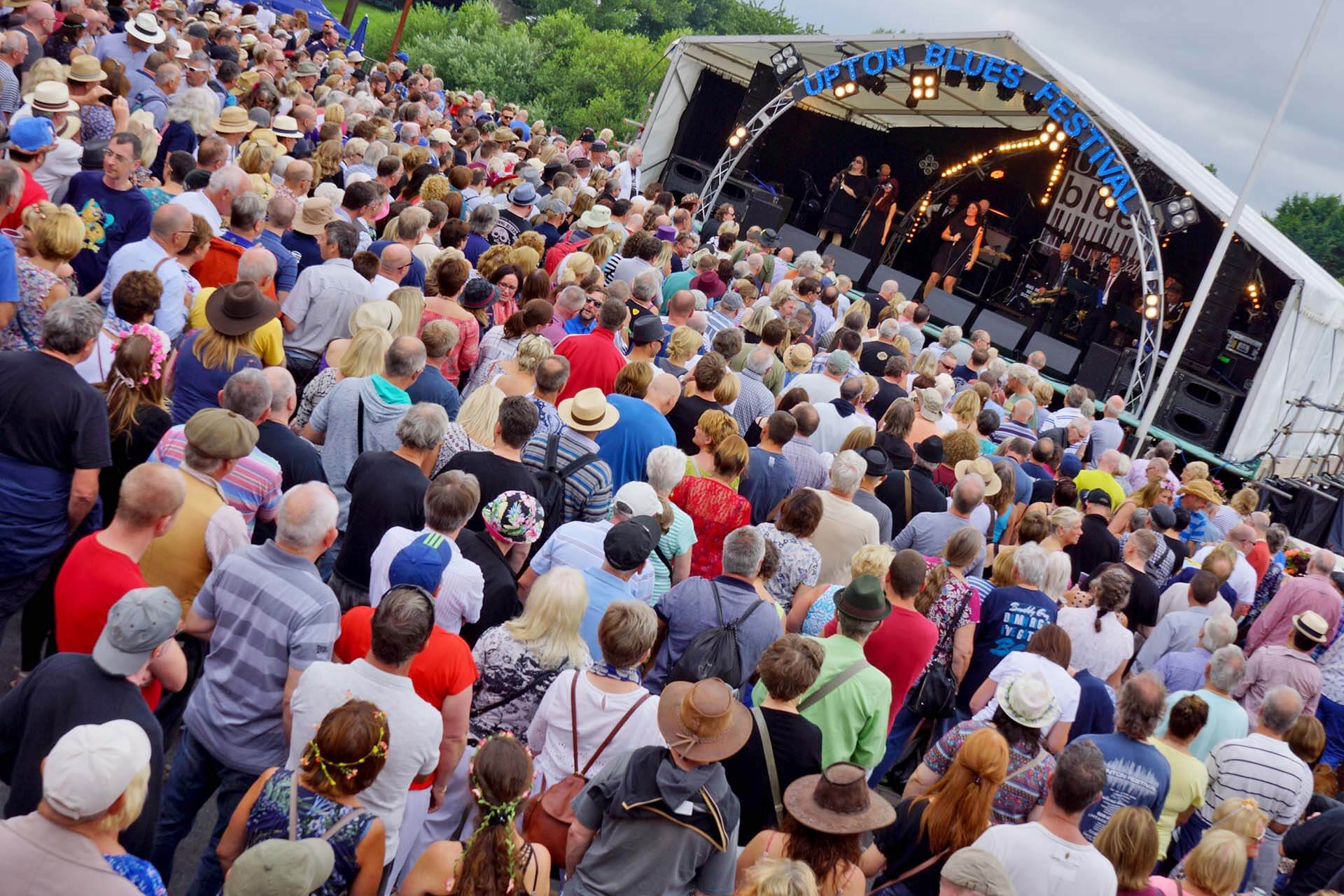 Daytime crowd on the Riverside by Oliver Carpenter