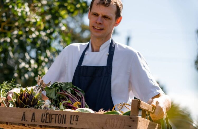 Pensons head chef Chris Simpson collecting produce from the kitchen garden