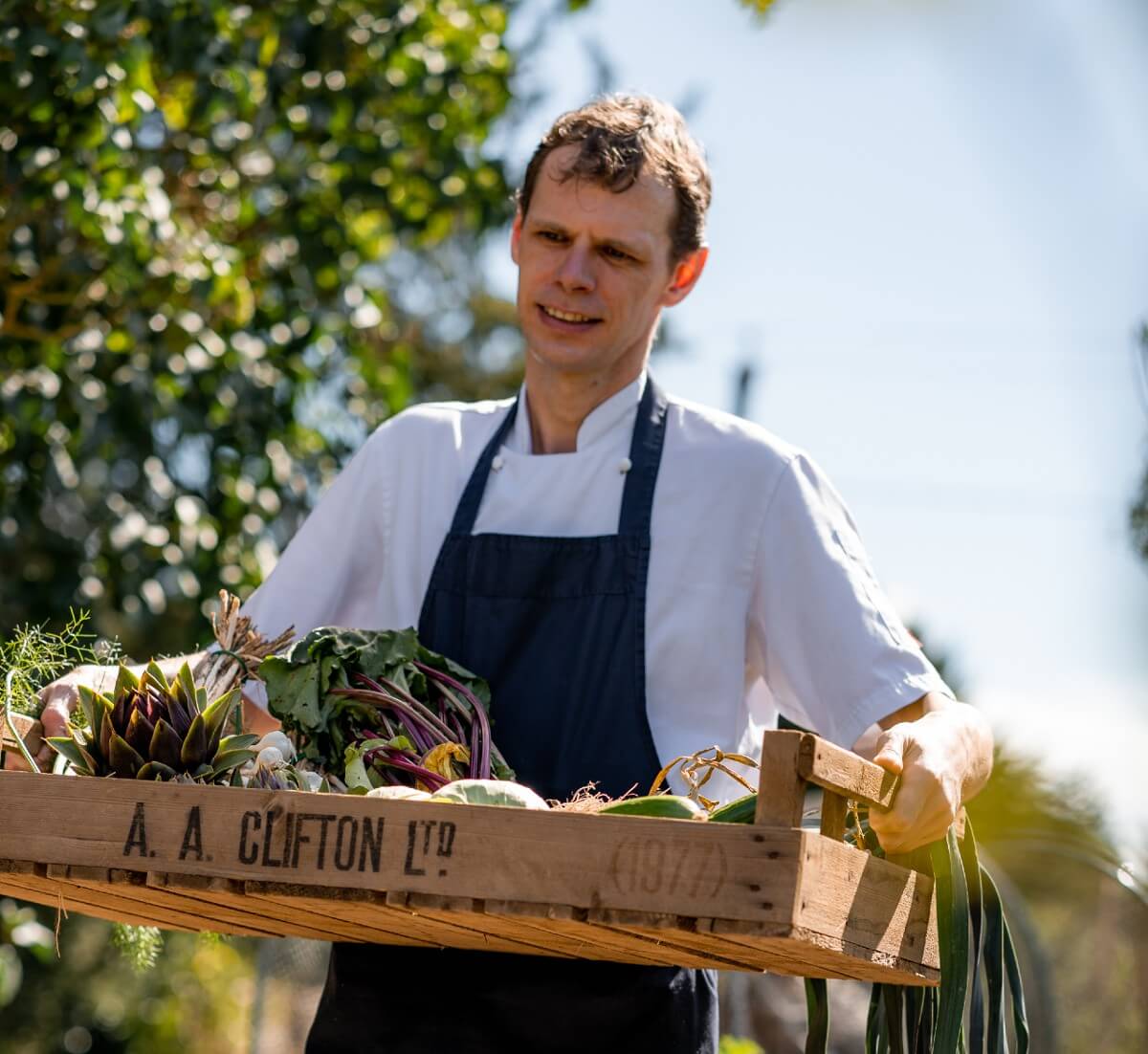 Pensons head chef Chris Simpson collecting produce from the kitchen garden