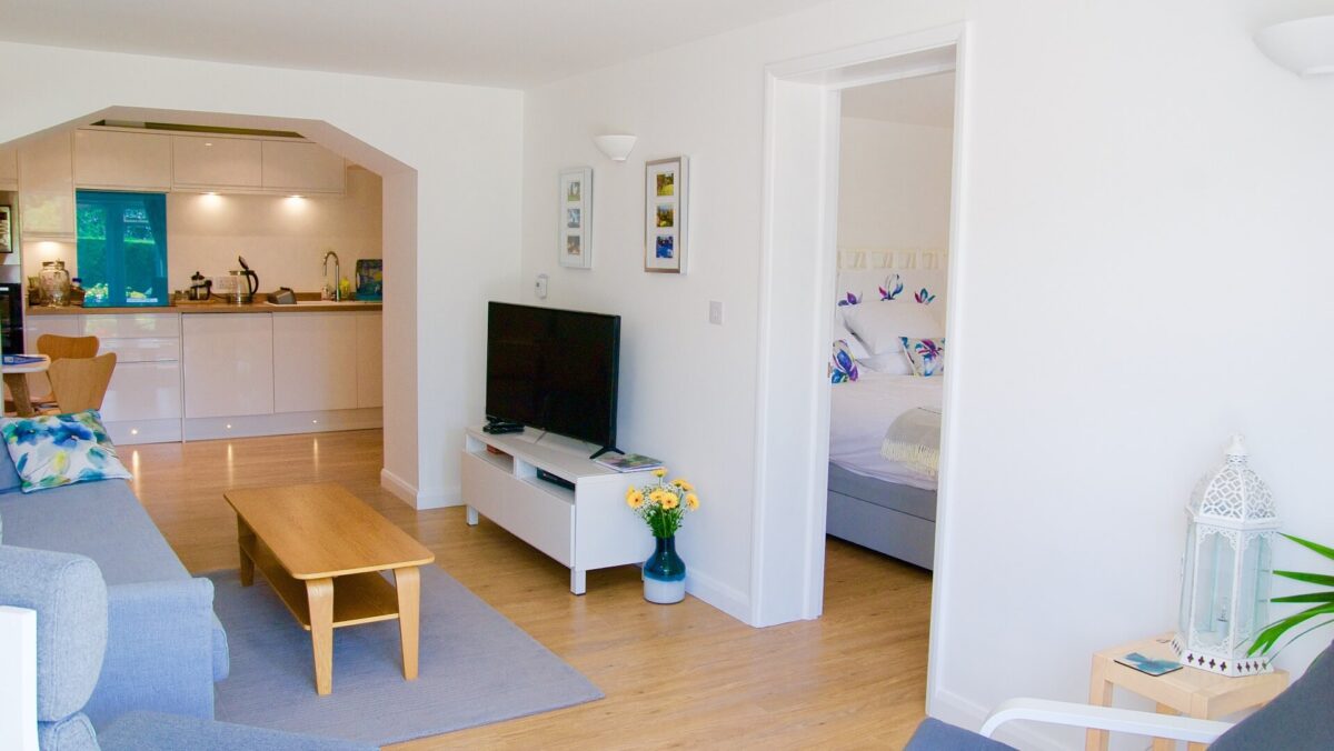 Sitting area with coffee table and TV