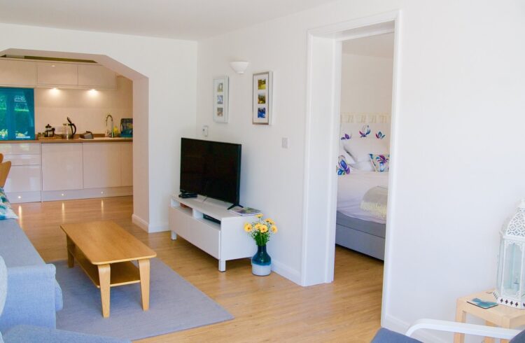 Sitting area with coffee table and TV