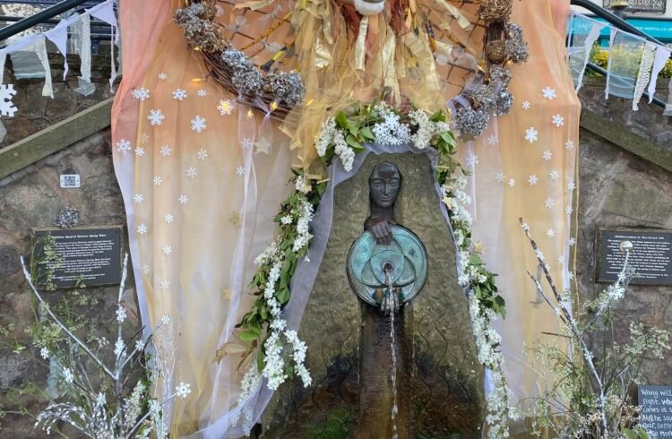 Malvhina fountain decorated with a lion head