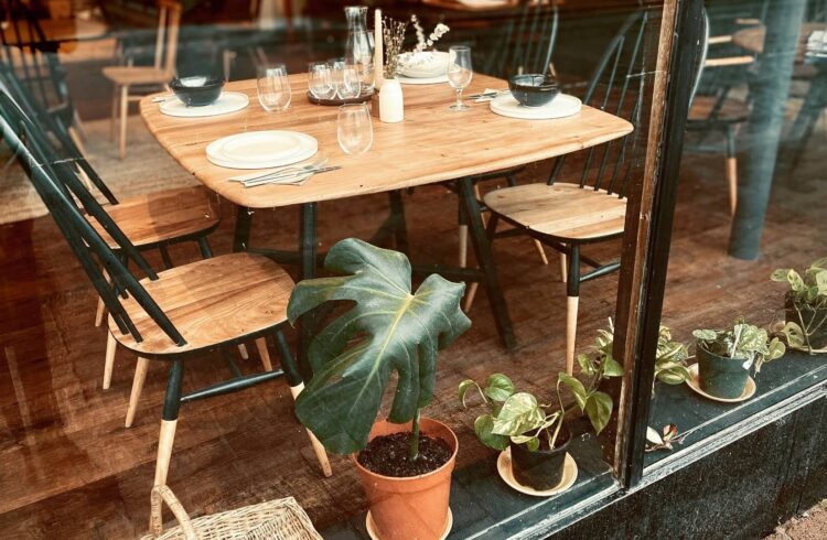 View of indoor tables and chairs at Faun