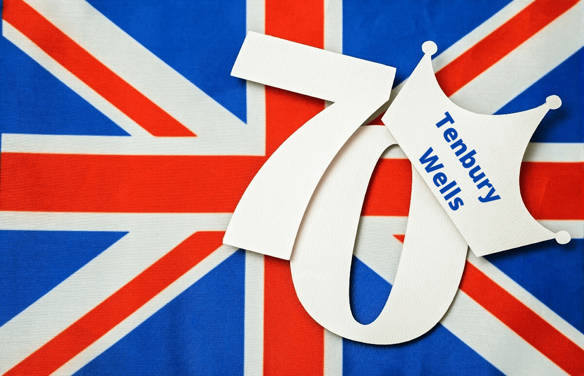 The Union Flag overlaid with a 70 wearing a crown