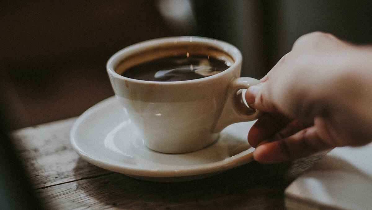 A cup of coffee on a table