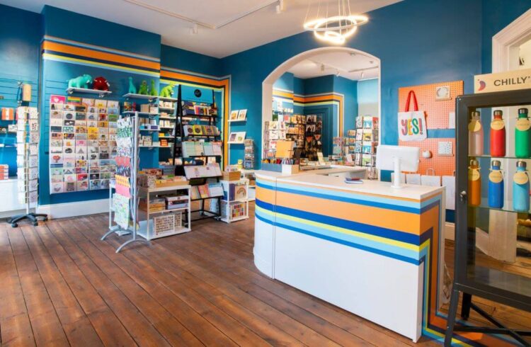 Card shop interior with colourful orange yellow and blue interior