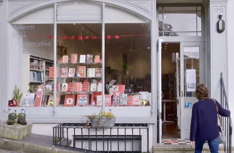 Shopper entering Malvern Book Co-operative store