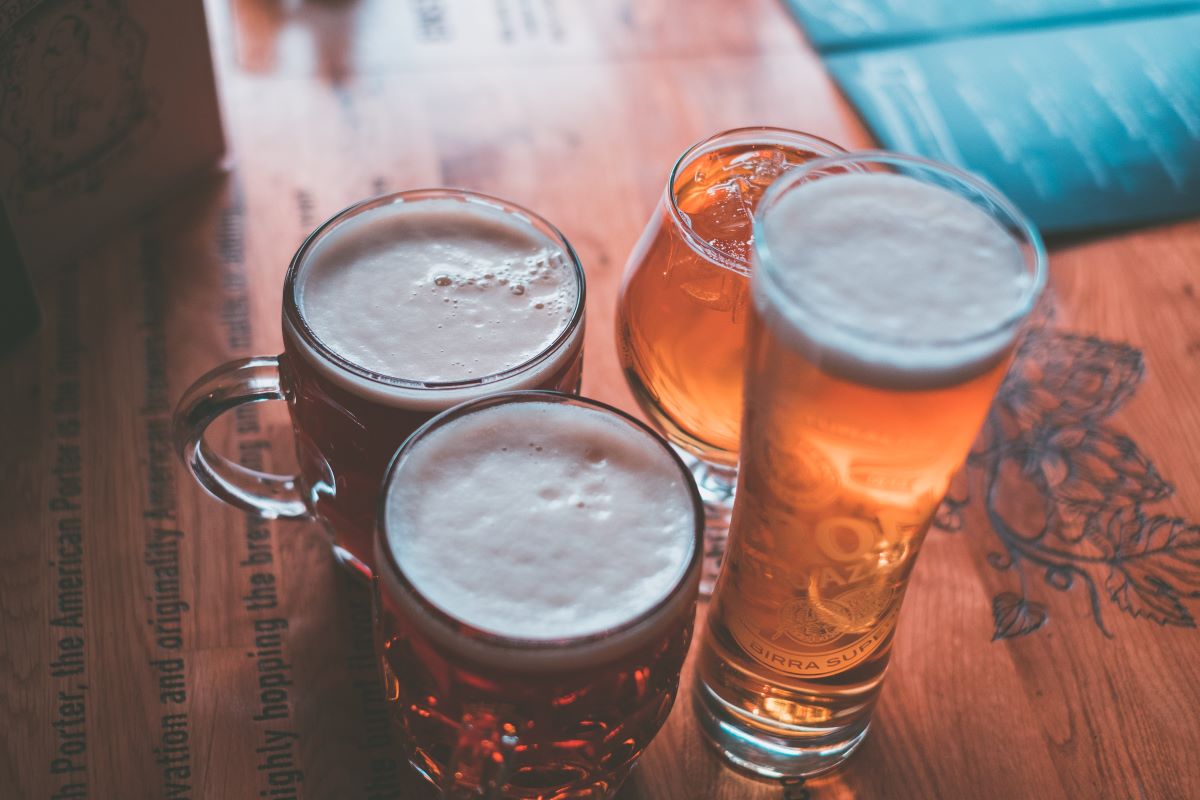 four beers on a table