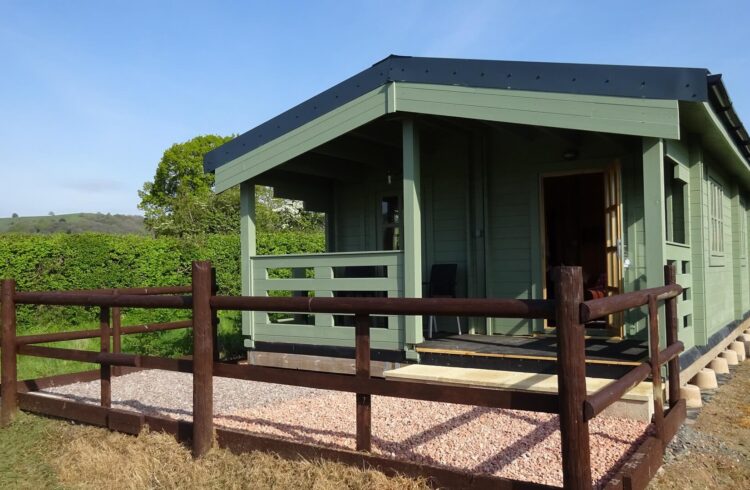 Exterior view of Oak Lodge (painted green)