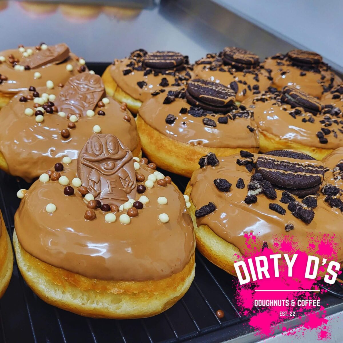 doughnuts with caramel icing and biscuits in top