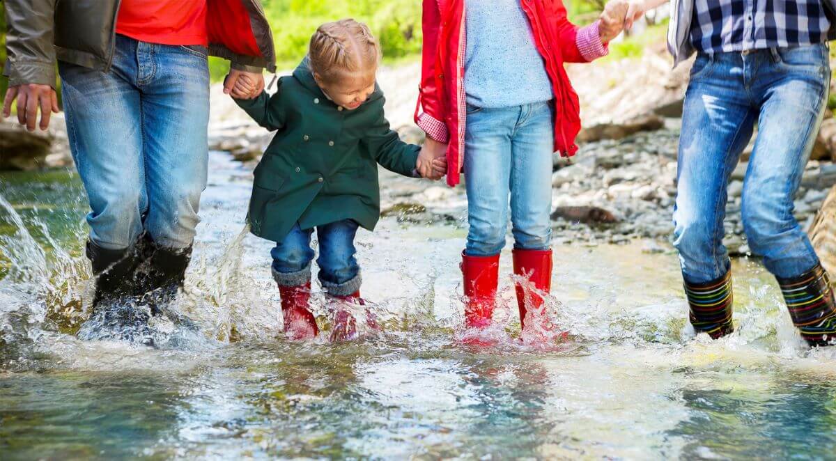 Family Splashing in some puddles