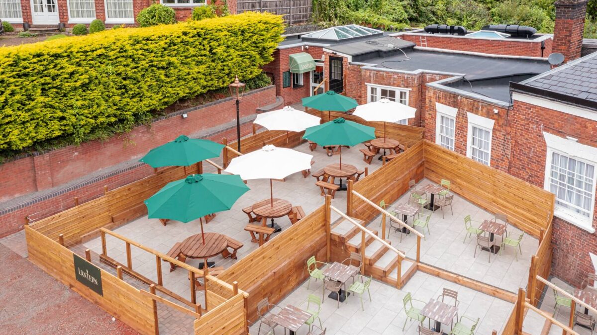 Outdoor seating on terrace with parasols