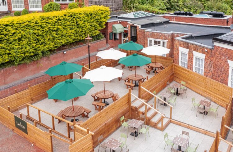 Outdoor seating on terrace with parasols