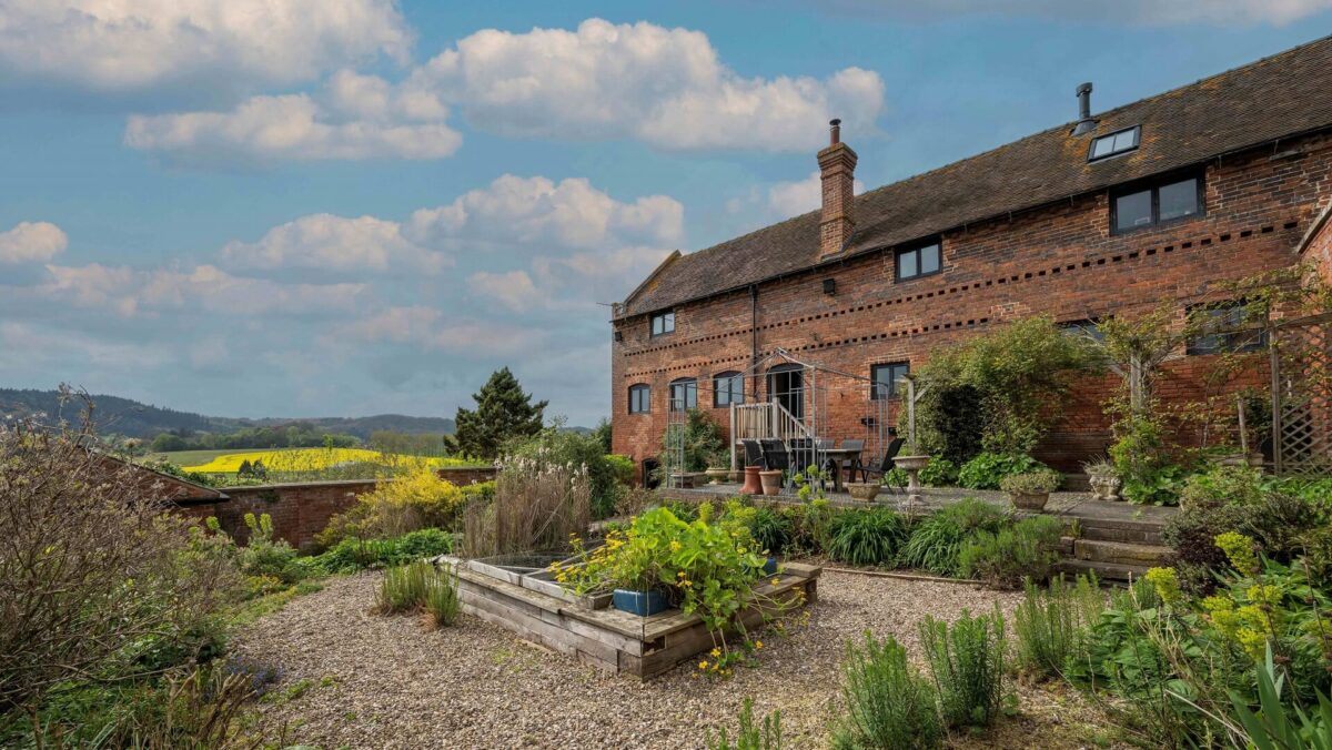 Garden surrounding barn