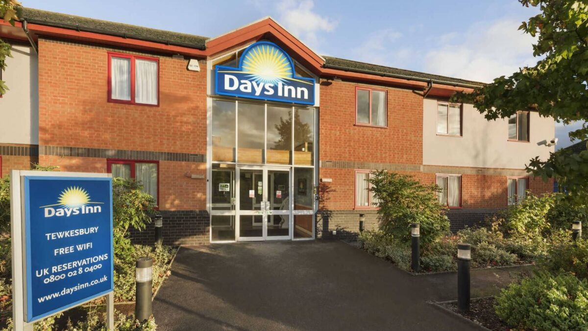 Exterior of Days Inn showing glass doors at entrance