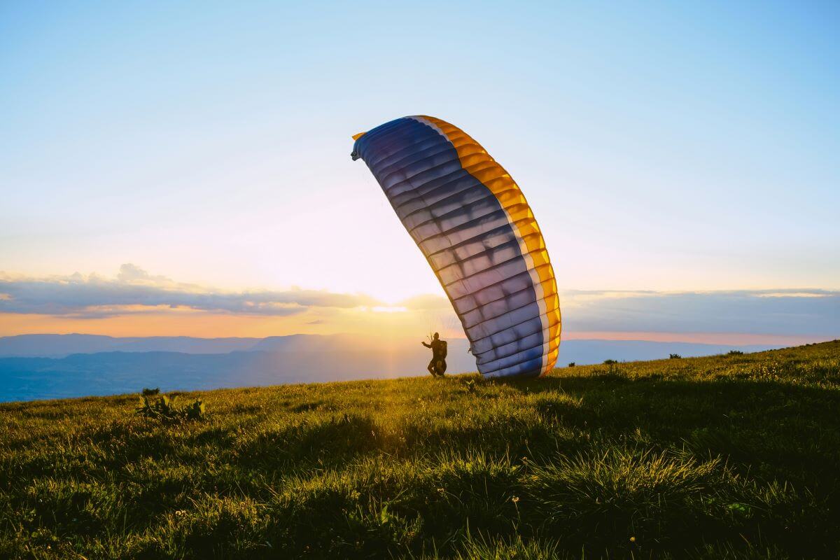 A person talking off paragliding 