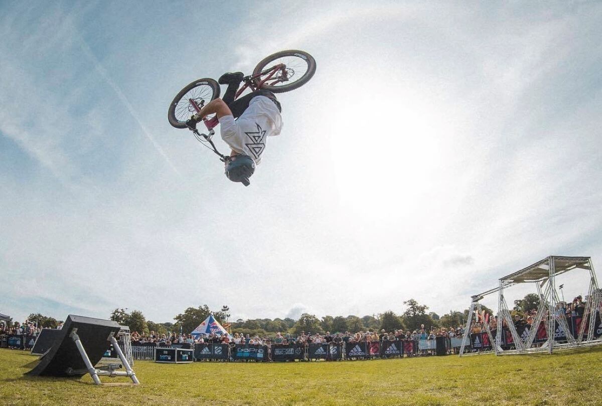 A person doing a flip on a BMX