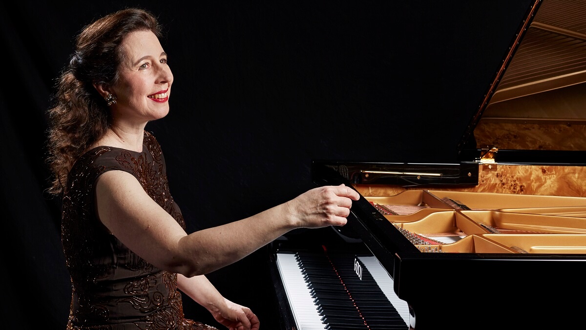 Angela Hewitt seated at the piano