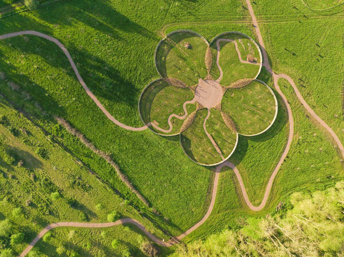 Aerial photo of gardens where a sculpture creates a floral design