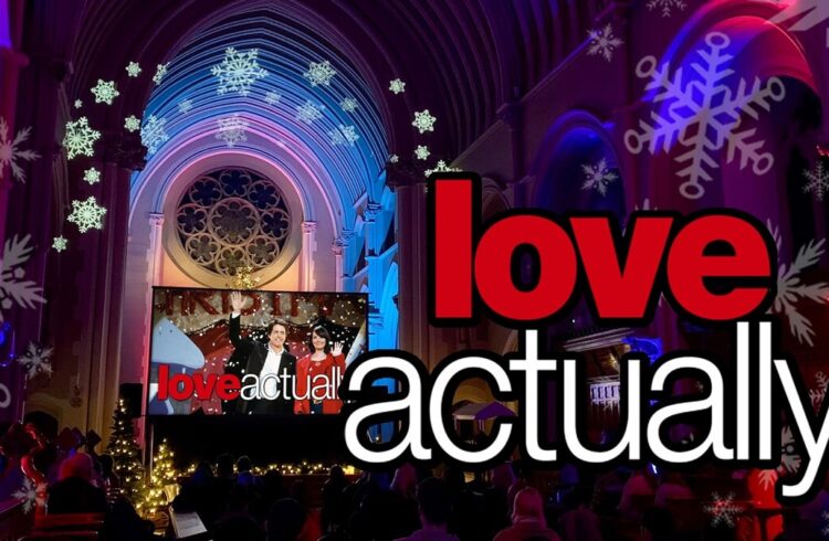 A scene from the film 'Love Actually' shown on a big screen at Stanbrook Abbey